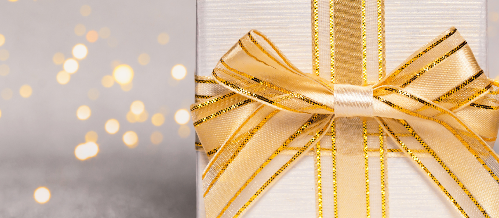 Gold lights with gold present on gray background